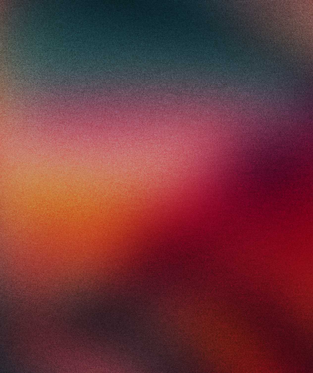 An abstract image featuring a gradient of colors from dark green at the top to red, orange, and pink in the middle, blending into darker shades towards the bottom.